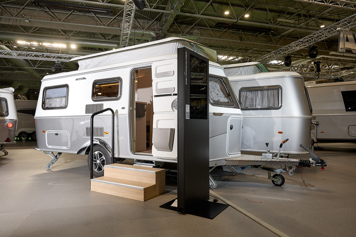 Eriba Touring 542 exterior, classic design, two tone white and grey, pop top roof, single axle
