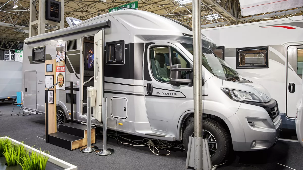 Coachbuilt motorhome, white, black stripe