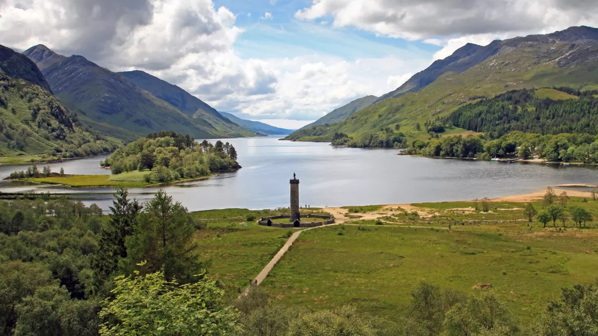 View looking out over Loch Shiel and the Glenfinnan Monument commemorating the Jacobite Rising