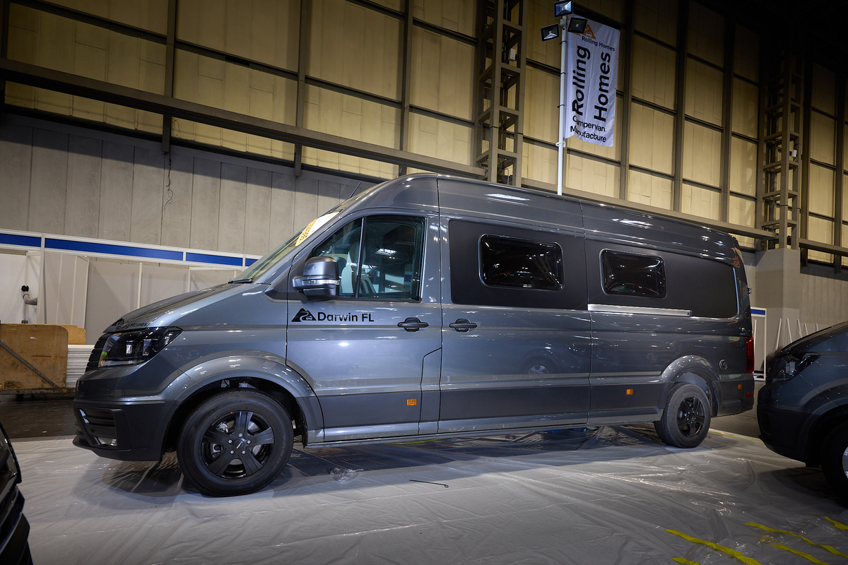 The Rolling Homes Camper Ltd Darwin FL has a dark grey exterior with black trim.  