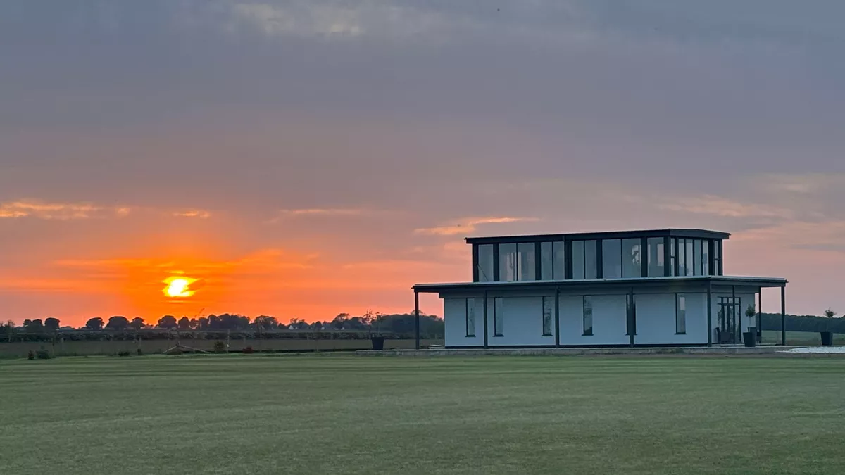Off the Radar, LN13 0AF, Alford, Lincolnshire, CL owner, 2026, field, grass, trees, building, sunset