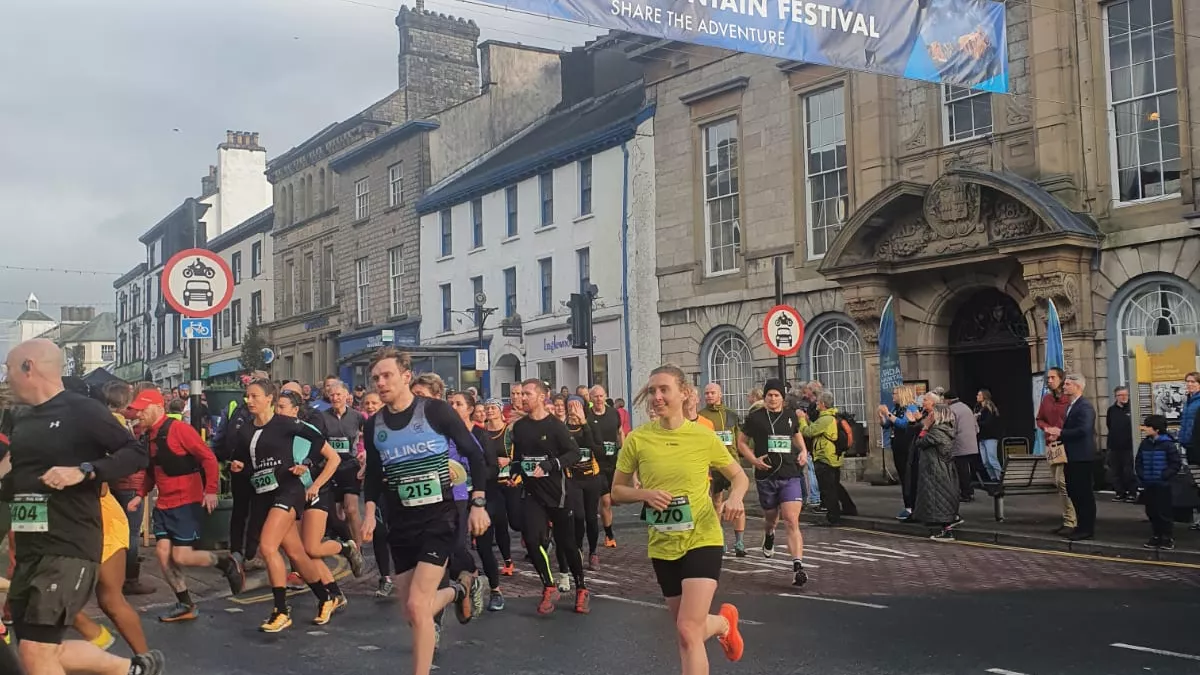 Lots of people running on the road in Kendal