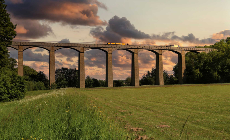 Barges on the sunlit Pontcysyllte Aqueduct in Wales
