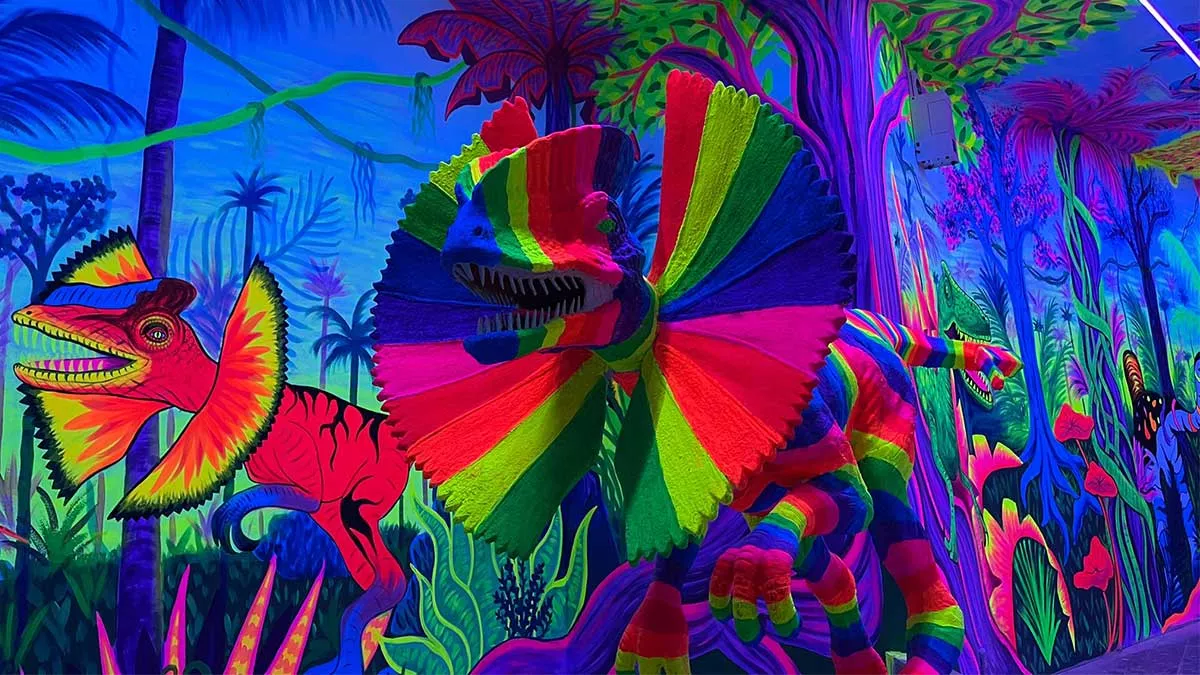 model dinosaur painted in neon colours