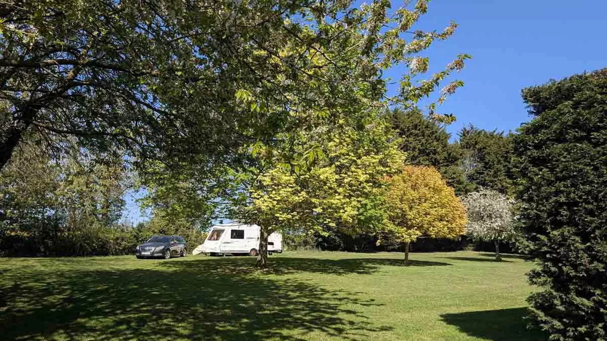 Stanwell Farm, IP14 4JA, Stowmarket, Suffolk, 2026, CL owner,  field, pitch, grass, trees, caravan, car