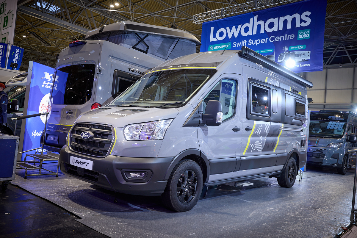 The Swift Trekker XL is grey with black trim with yellow, grey and black decals.  The habitation step is extended.  
