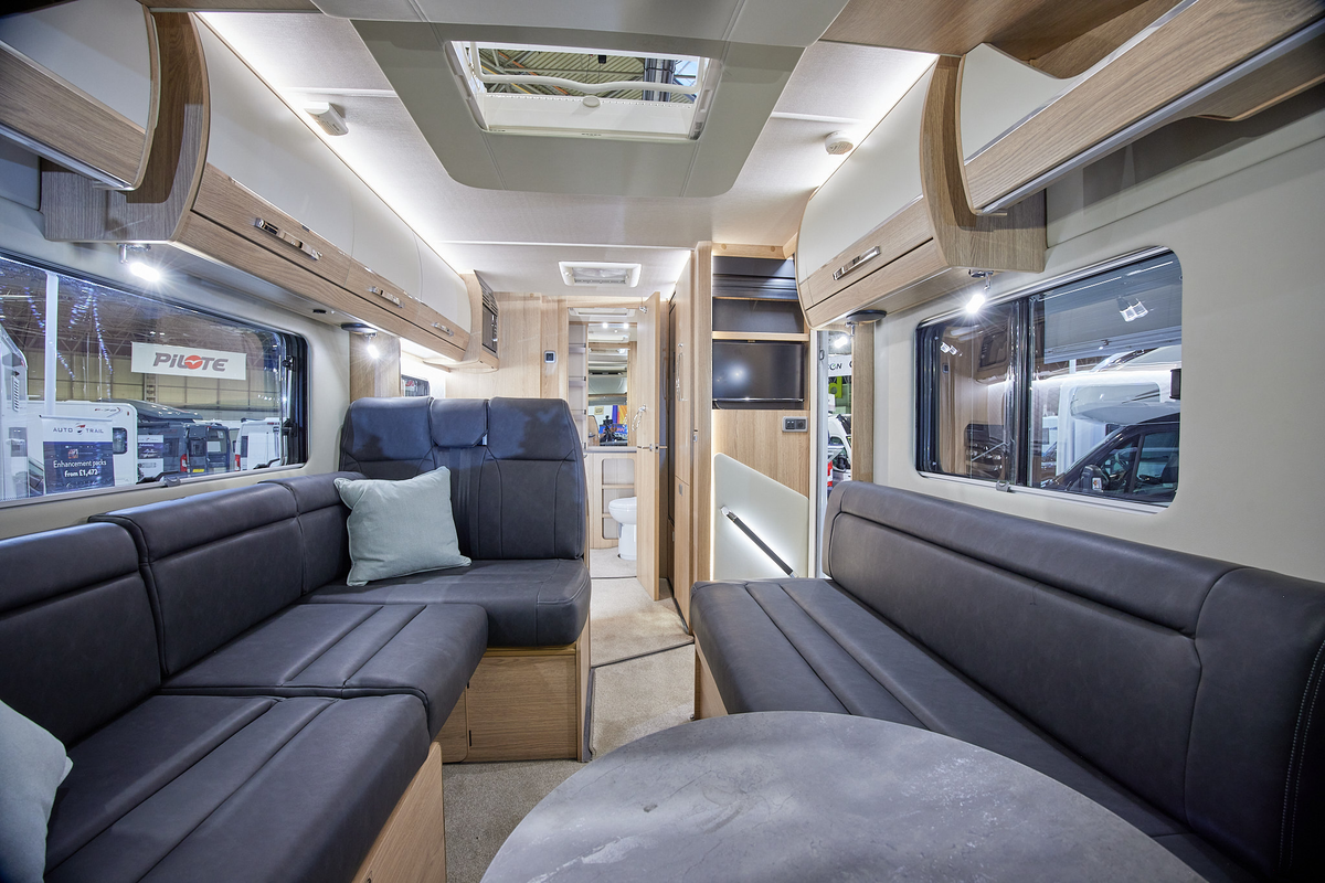 A Class interior, grey upholstery, cream and wood furniture