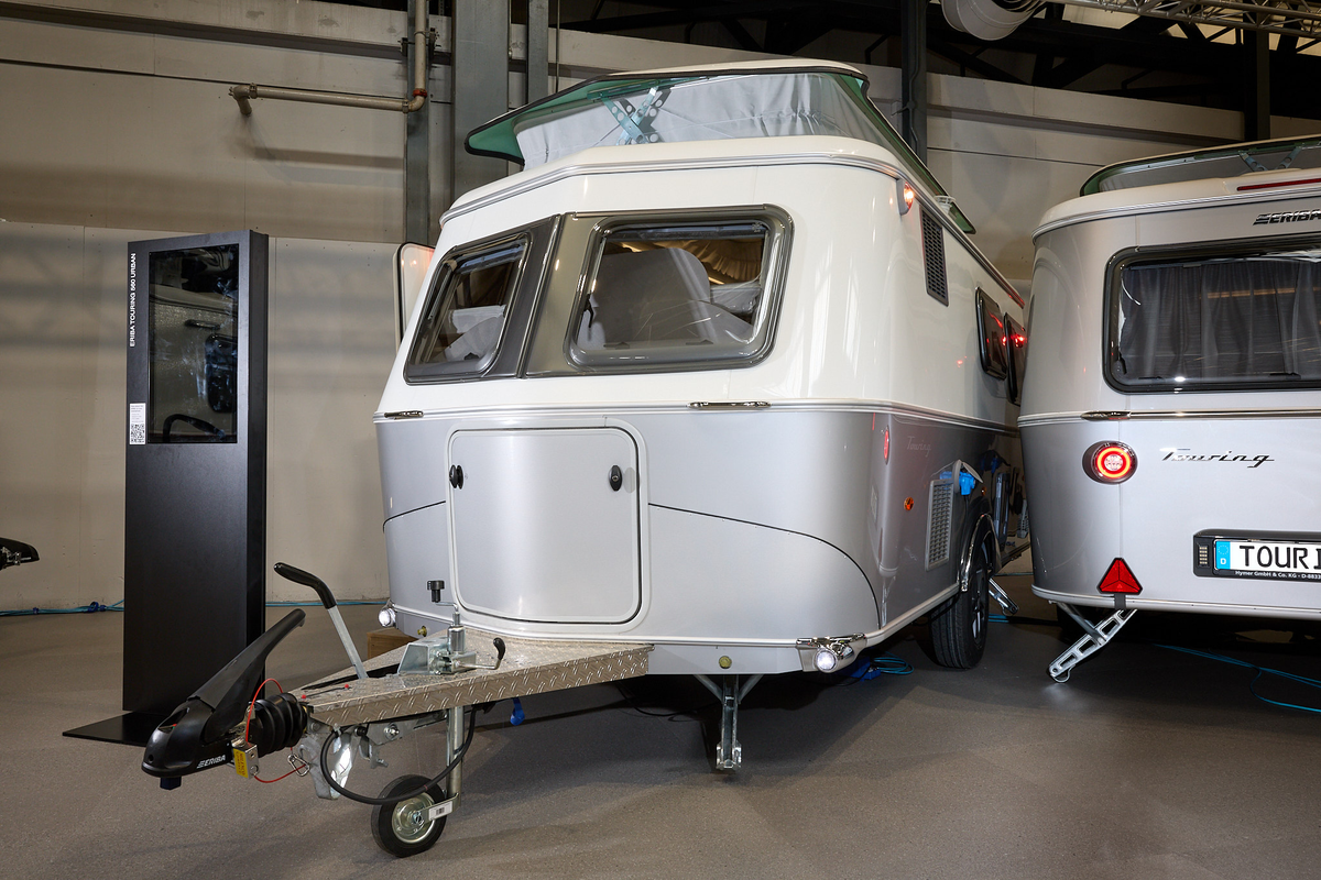Eriba Touring 560 exterior, front window, white/silver exterior, gold a frame, pop top roof