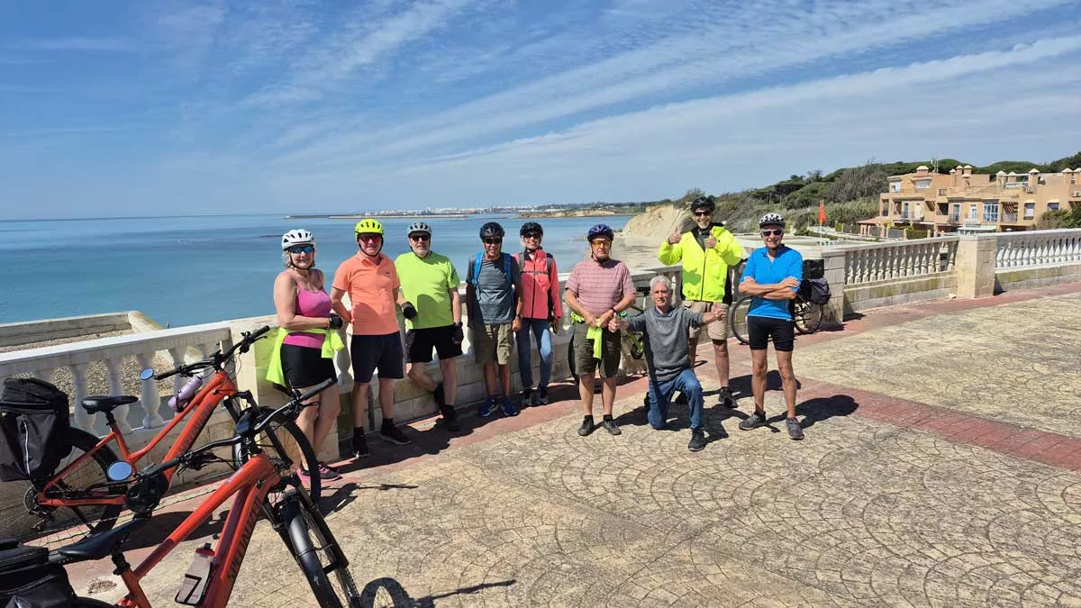 the cyclists stop for a sunny photo op!