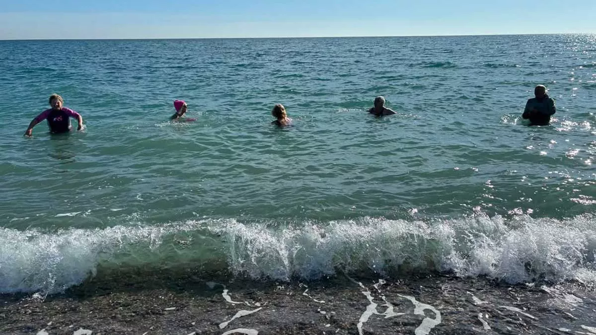 some of the gang take a dip in the sea