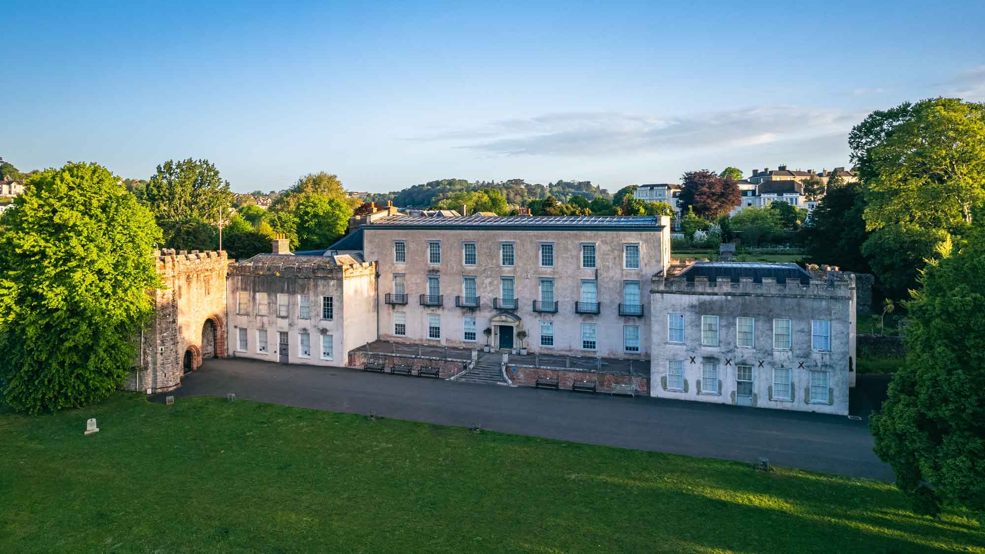 The front of Torre Abbey in evening sunlight