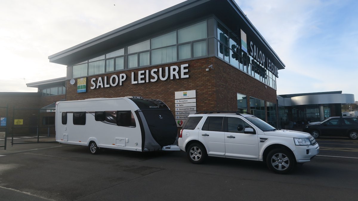 4x4 towing caravan outside Salop Leisure depot