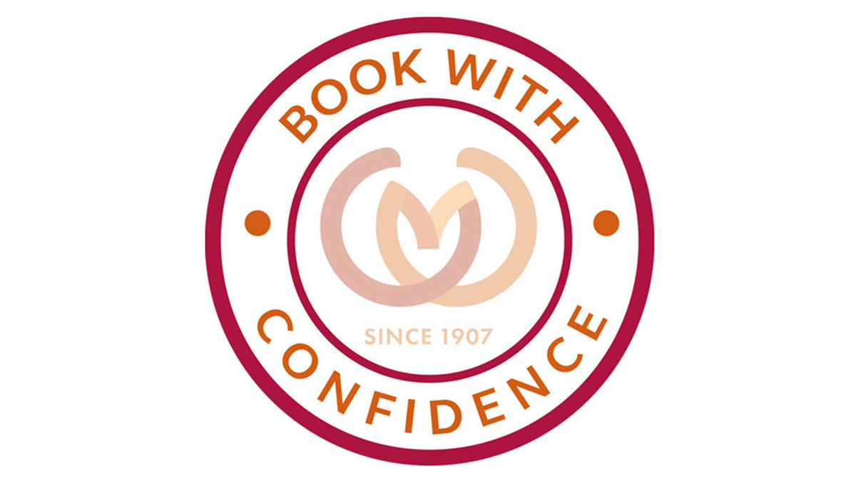 Circular logo with the words Book with Confidence surrounding the Caravan and Motorhome Club logo