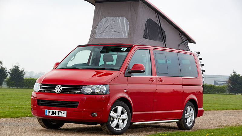 red converted motorhome with elevated roof