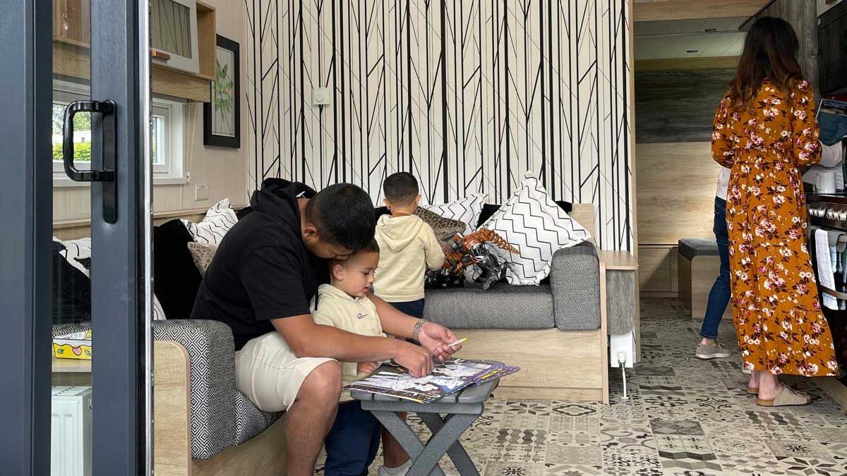 family in glamping cabin