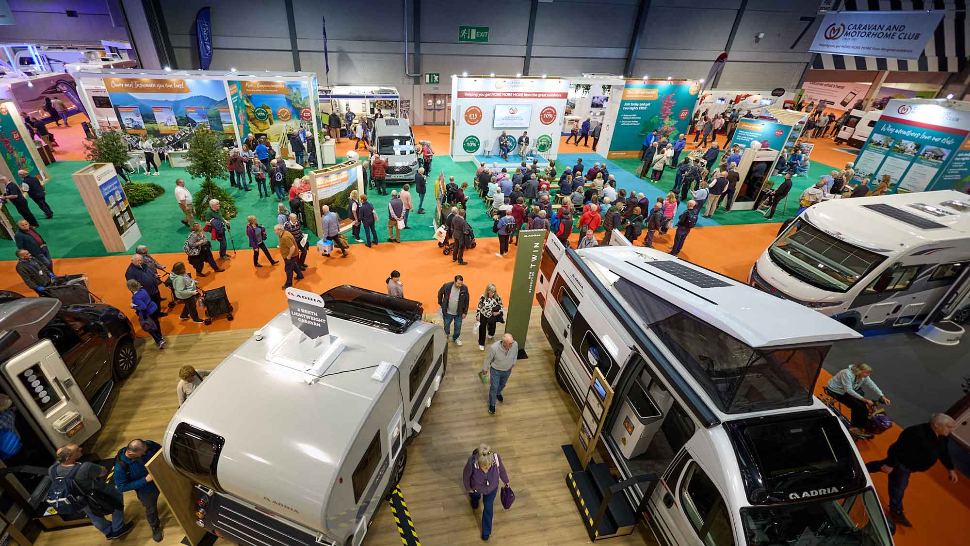 NEC view from above looking at motorhomes and people looking aroundd