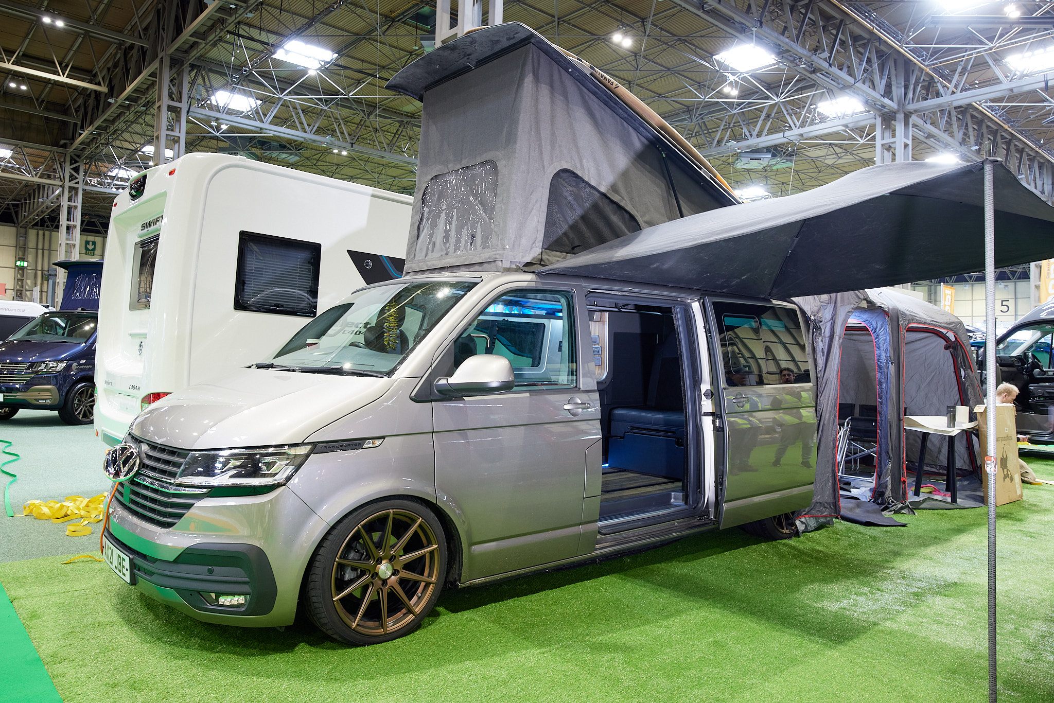 Campervan exterior, silver, raised roof, awning