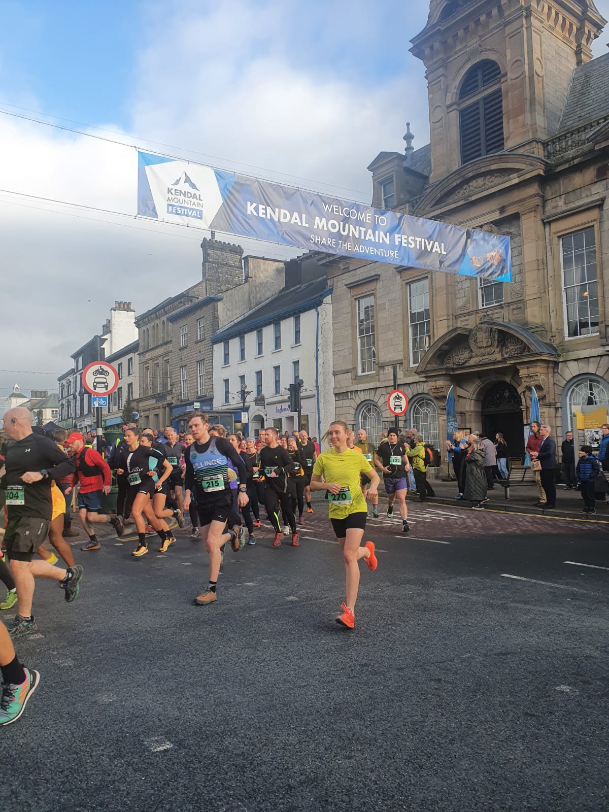 Lots of people running on the road in Kendal