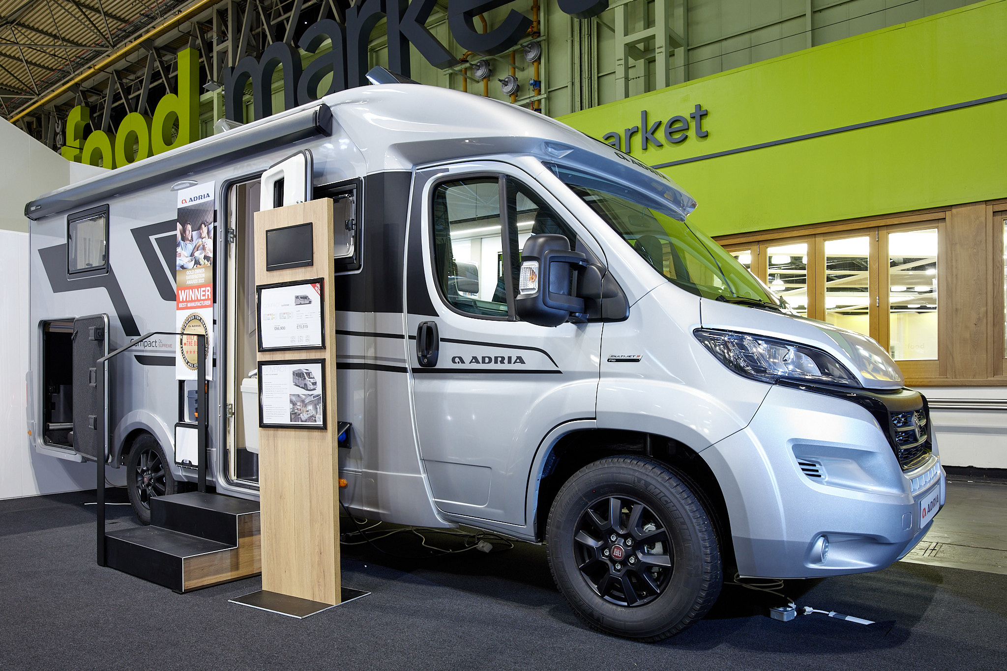 Coachbuilt motorhome, silver, Adria