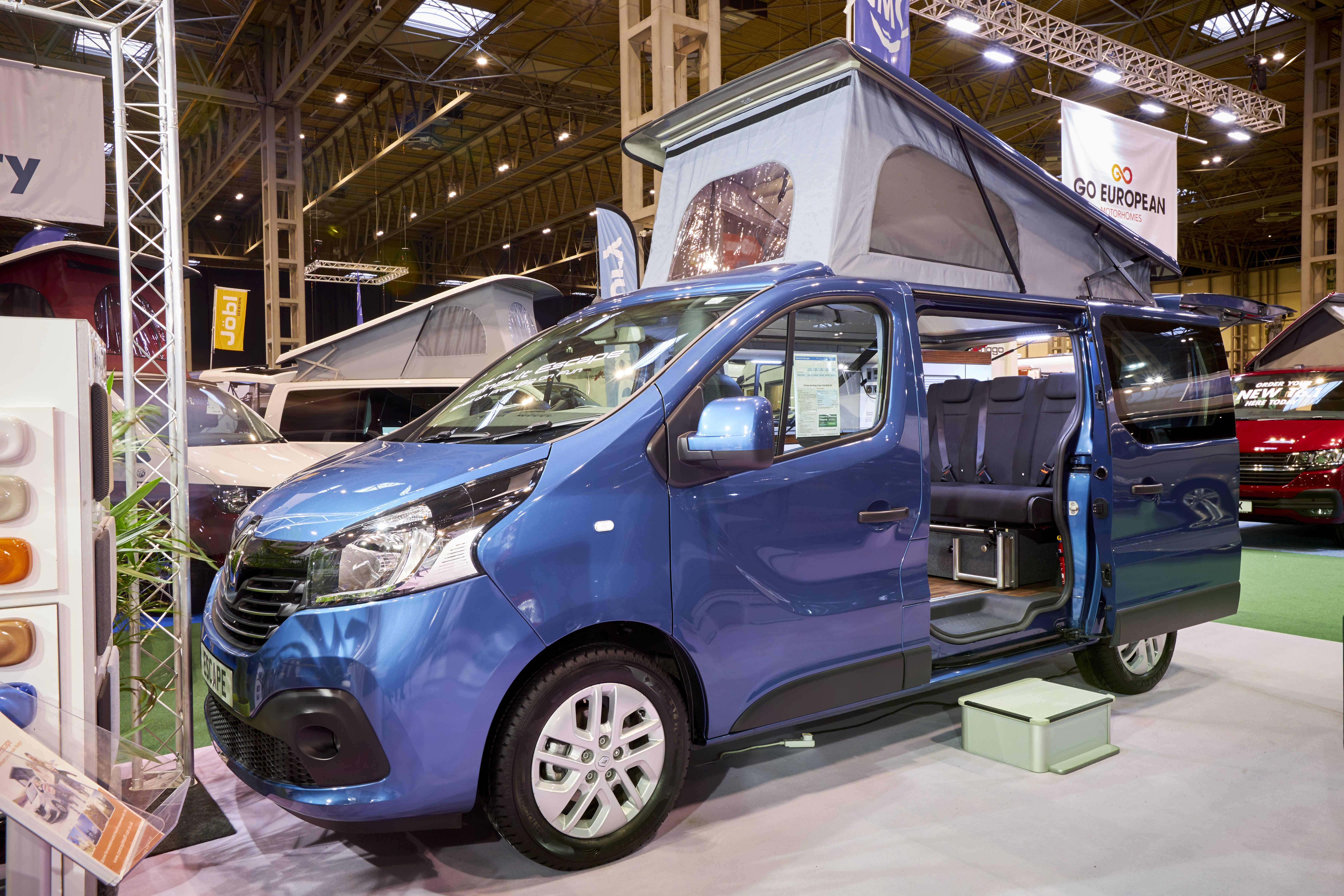 Blue campervan, rising roof