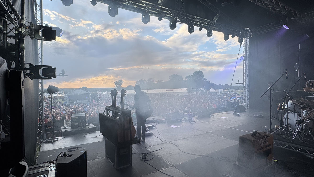 Oasish on stage looking out over the arena