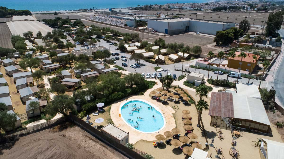 a campsite with an oval swimming pool