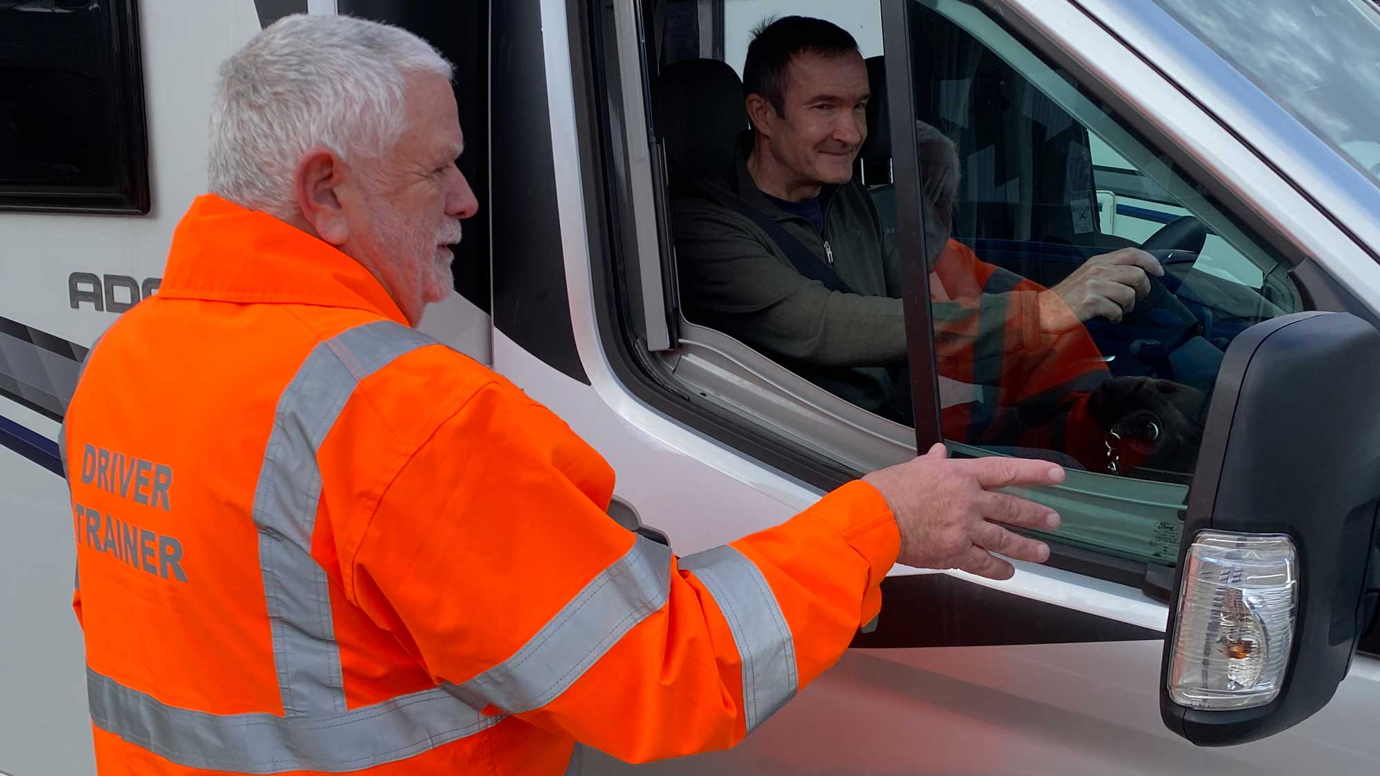 training course trainer explaining motorhome maneuvering