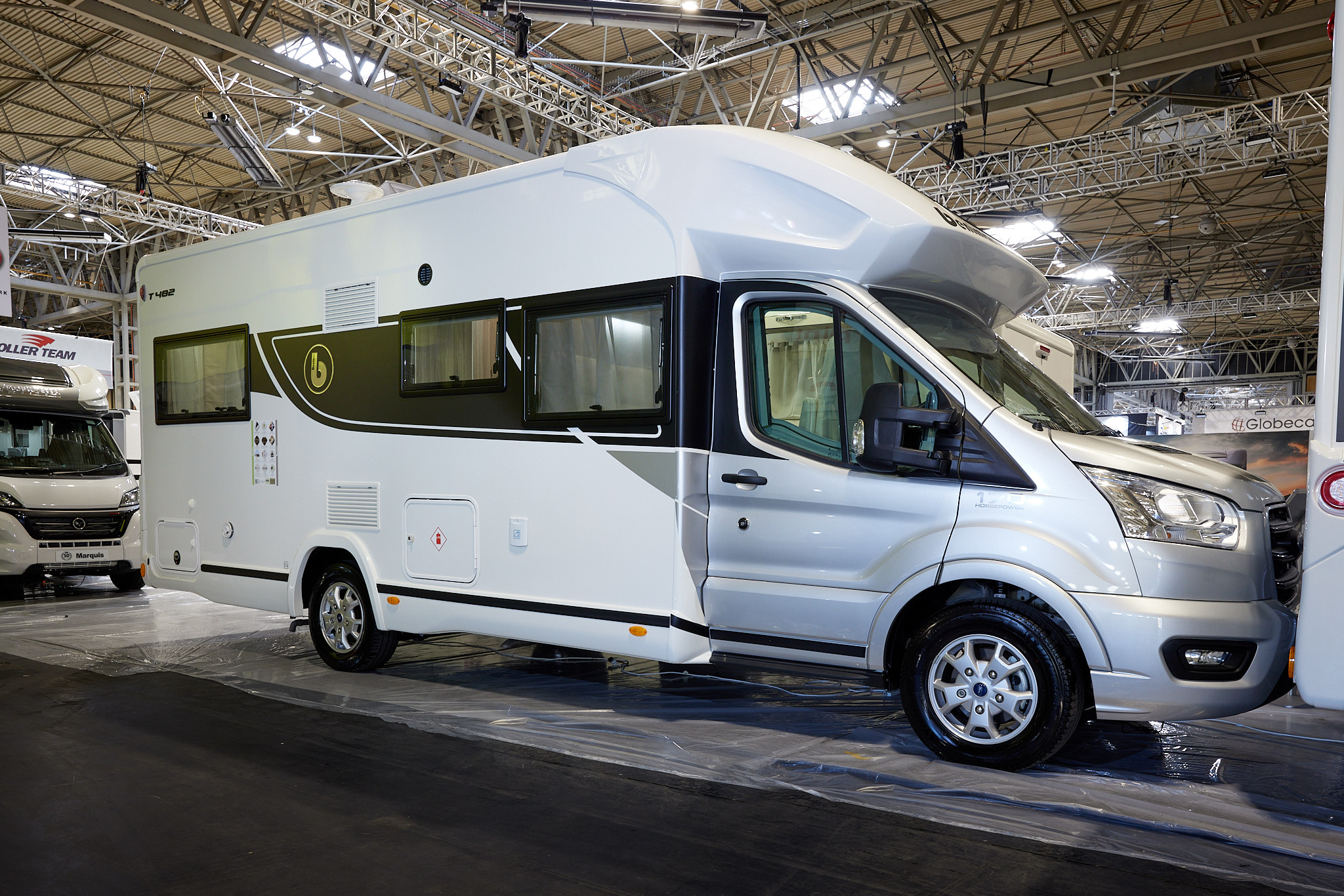 Benimar Tessoro 481 exterior, the vehicle has a silver cab with the body being predominantly white.