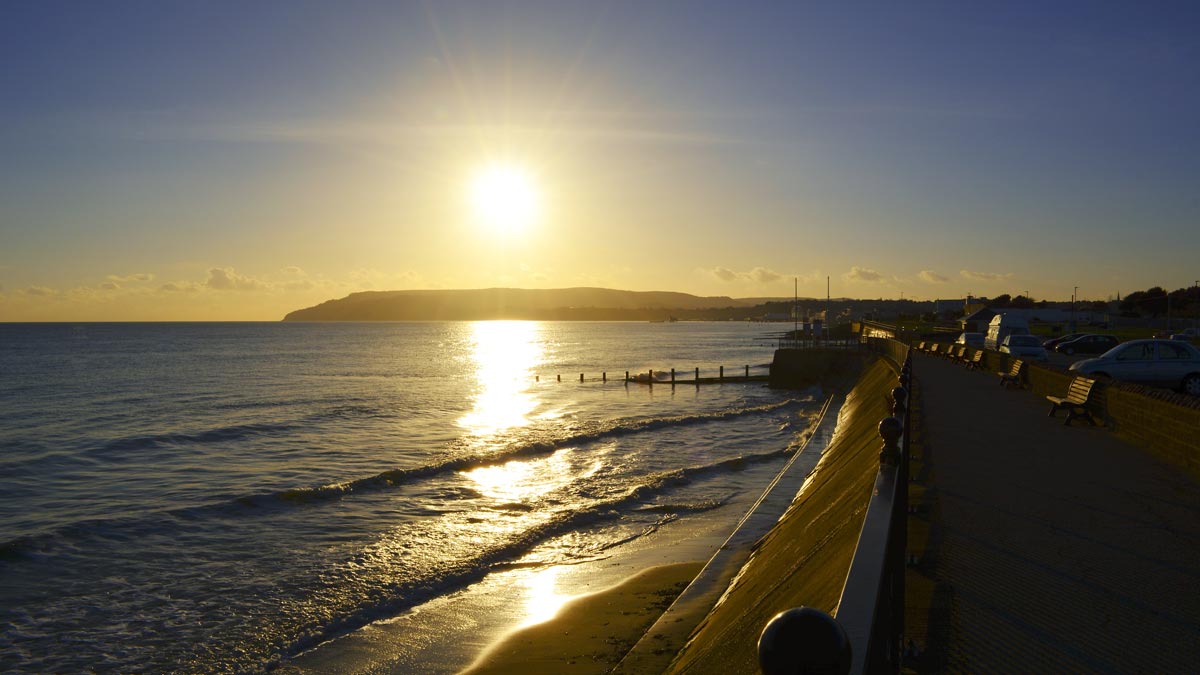 Winter sunset and view of the cliffs at Shanklin on the Isle of Wight, as seen from Yaverland at Sandown Bay during December