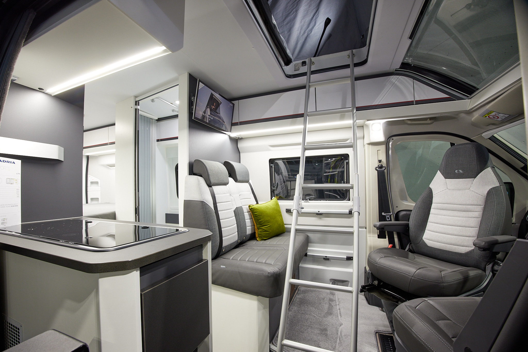 Grey white interior, silver ladder, pop top roof