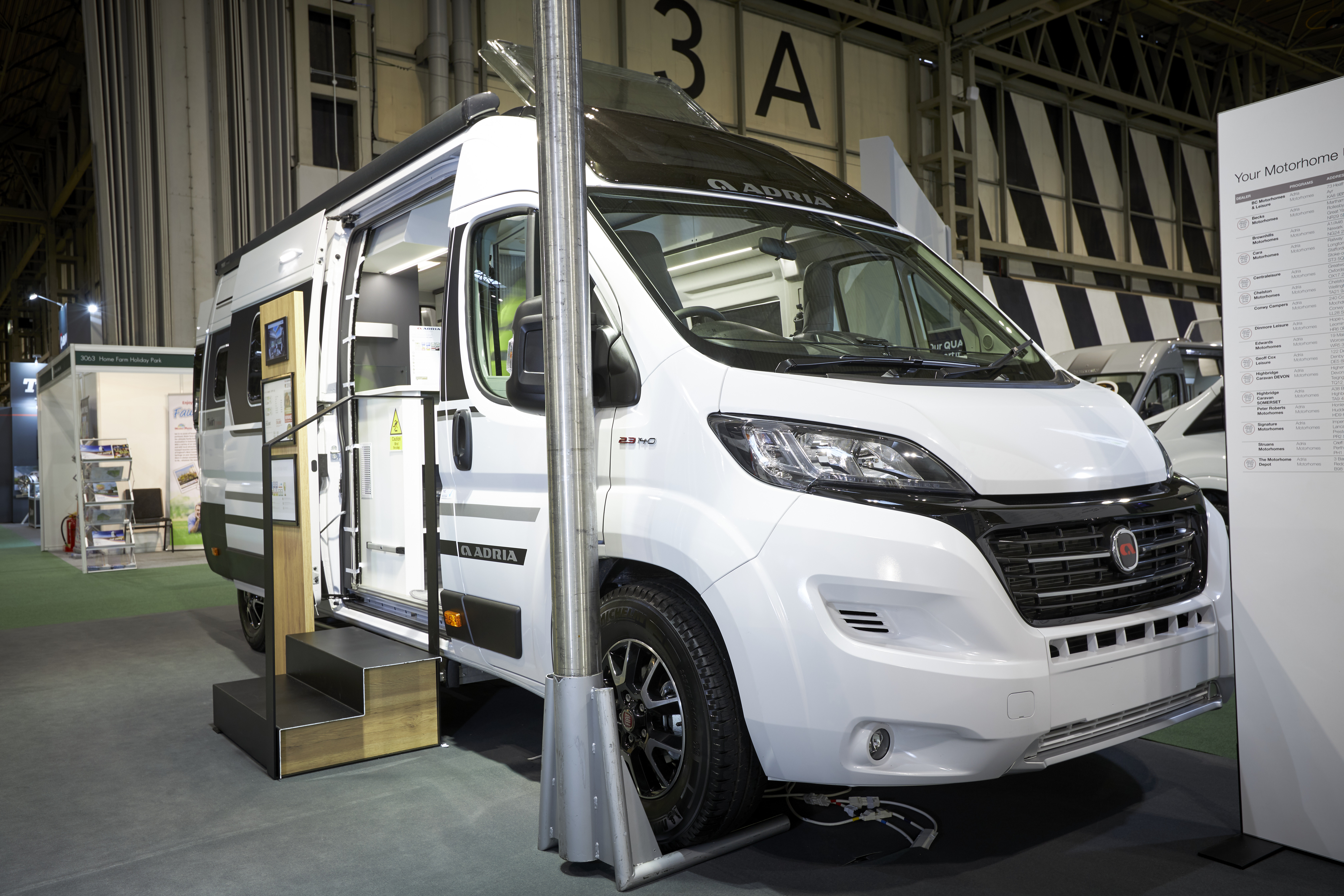 White can conversion, black roof, open skylight