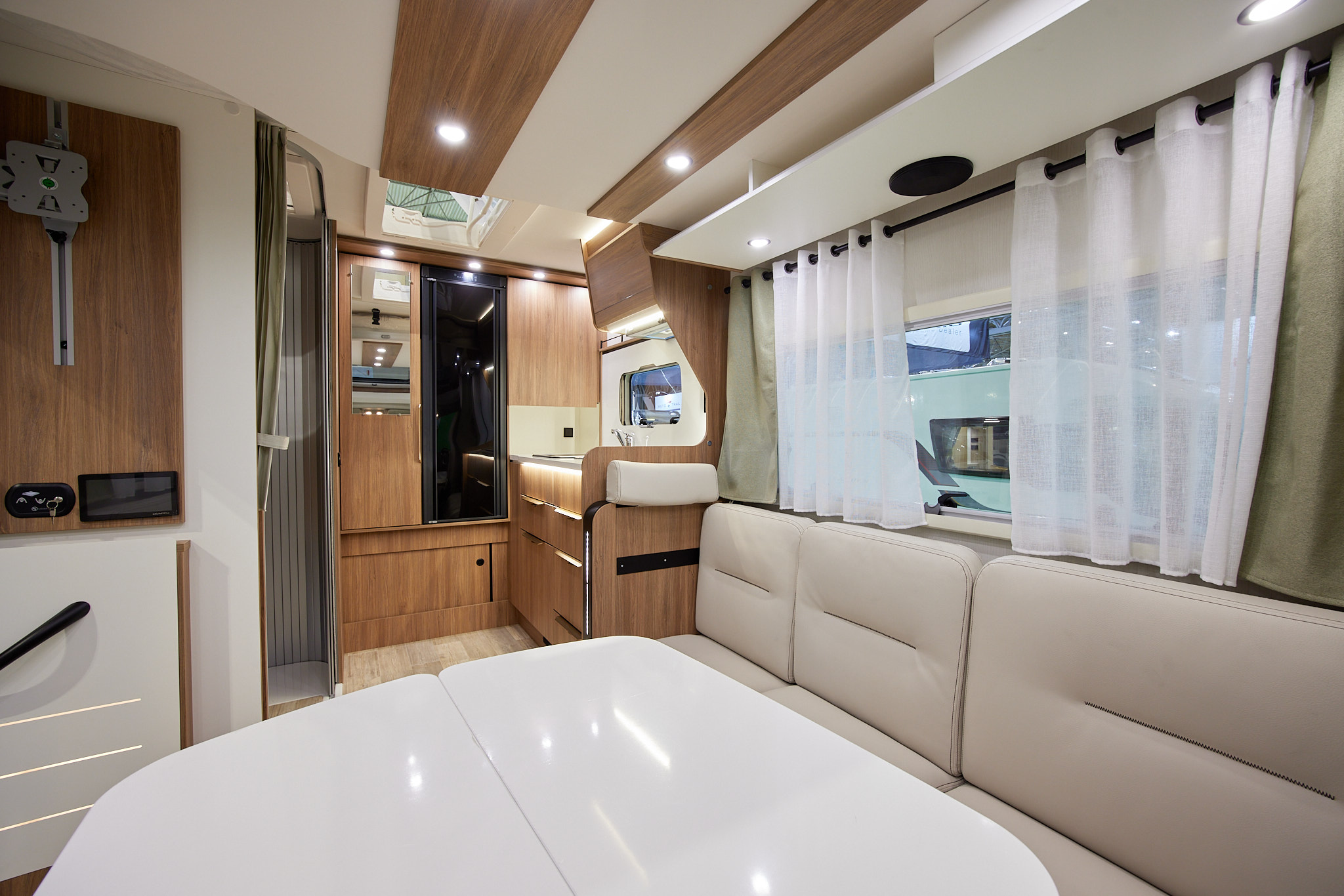 Cream upholstery, wooden furniture, cream interior