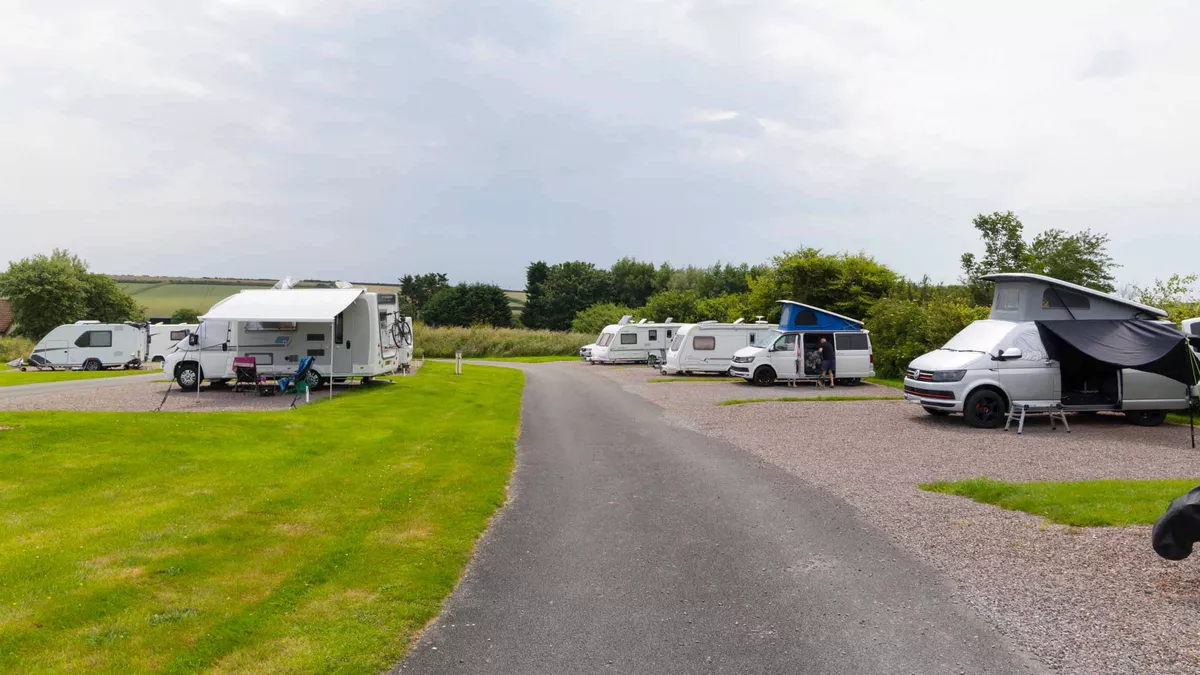 Campervans, caravans and motorhomes on hardstanding  awning pitches