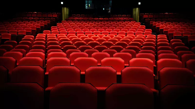 Depiction of the red seating found in a typical UK theatre.