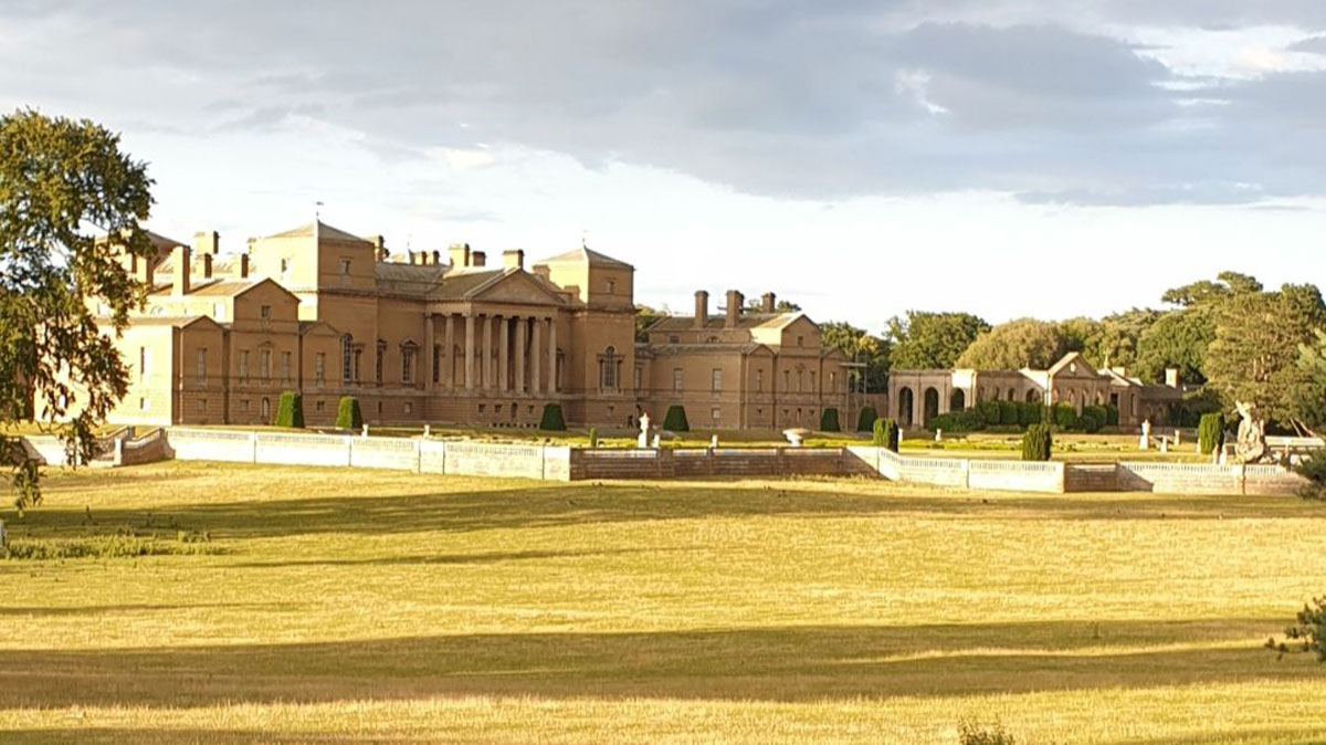Holkham Hall bathed in golden afternoon sunshine
