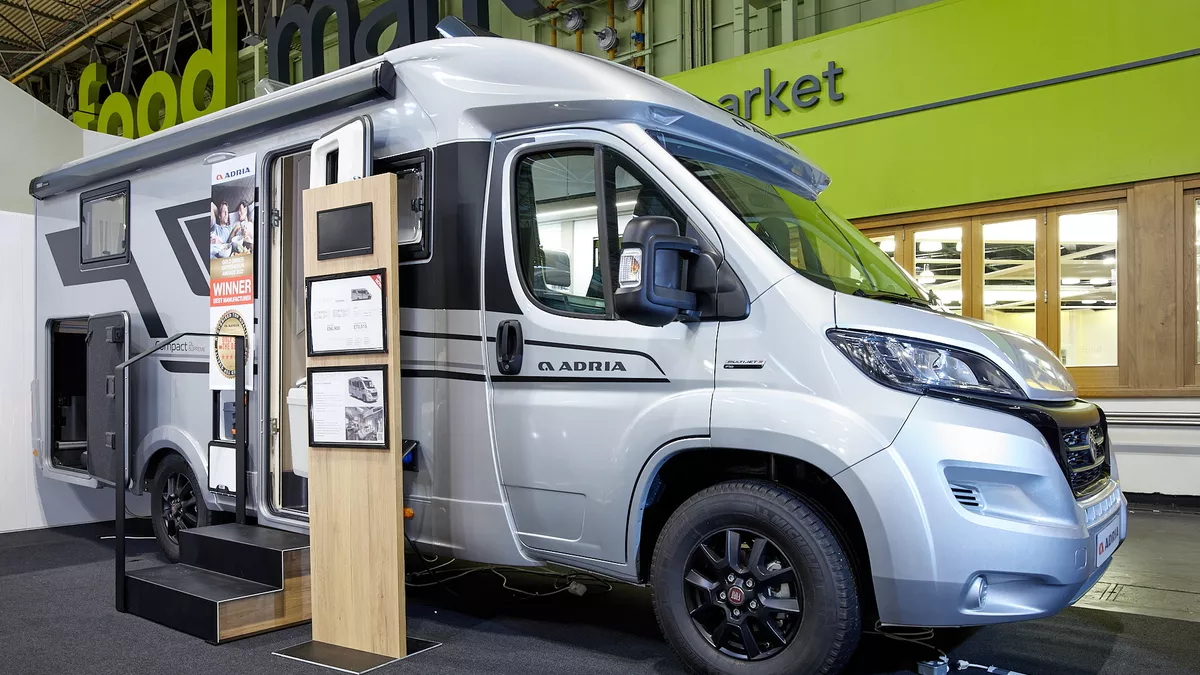 Coachbuilt motorhome, silver, Adria