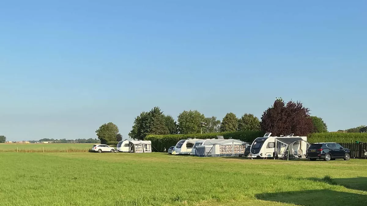 The Farm, PE22 7EU, Boston, Lincolnshire, CL owner, 2026, field, pitch, grass, trees, caravans, cars, awning