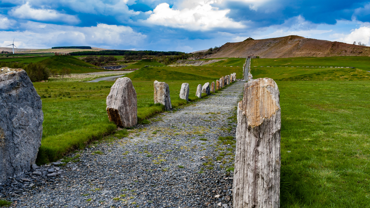 standing stones lining a pathway in Scotland