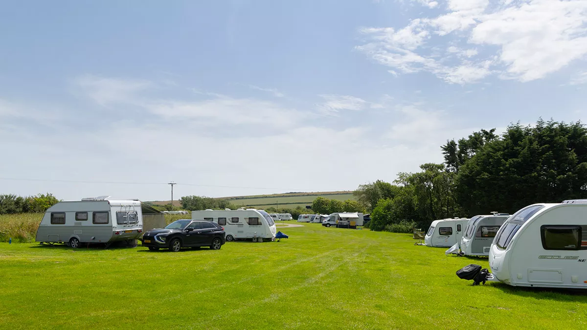 Various outfits on grass touring pitches