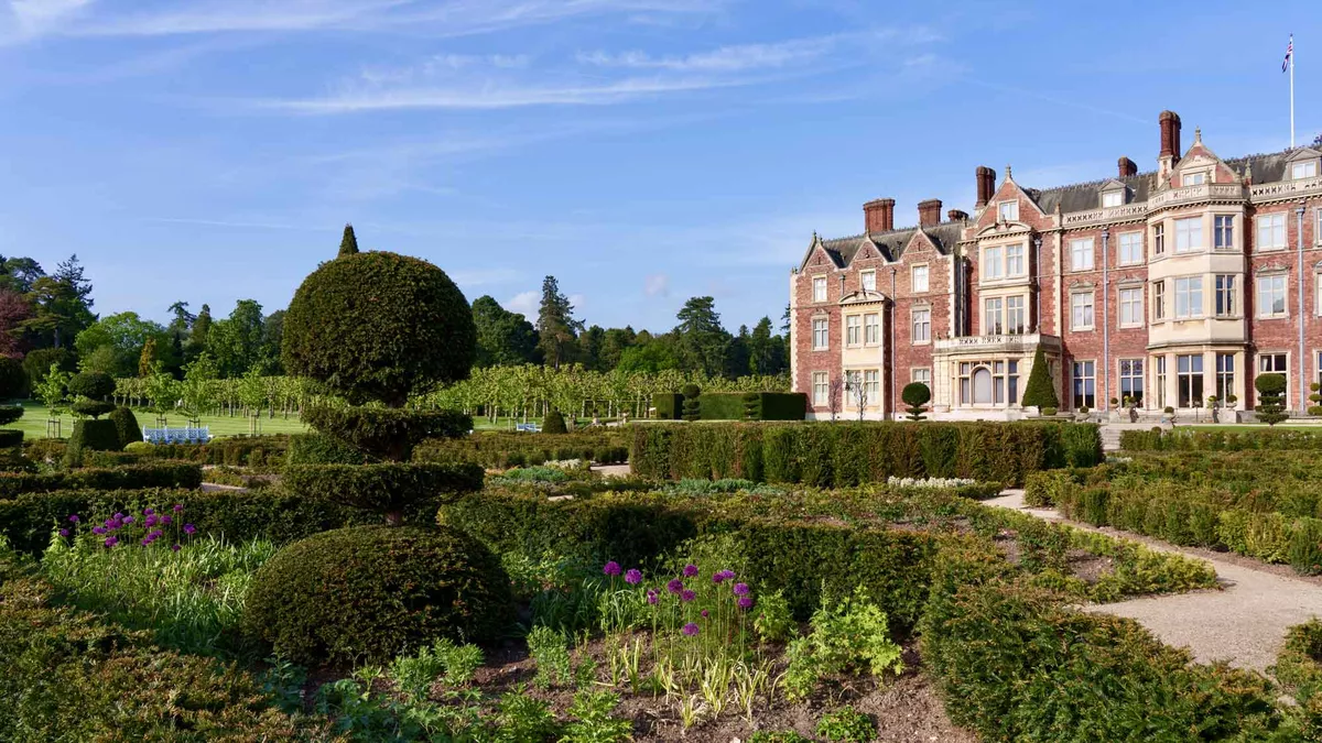 side view of the house and gardens at Sandringham