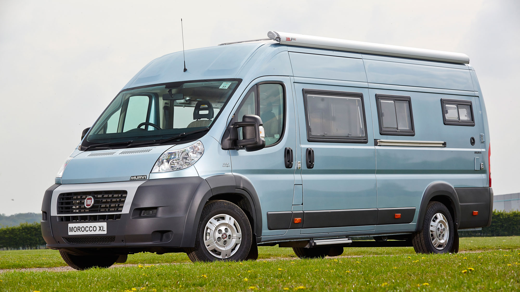 converted motorhome with fixed roof